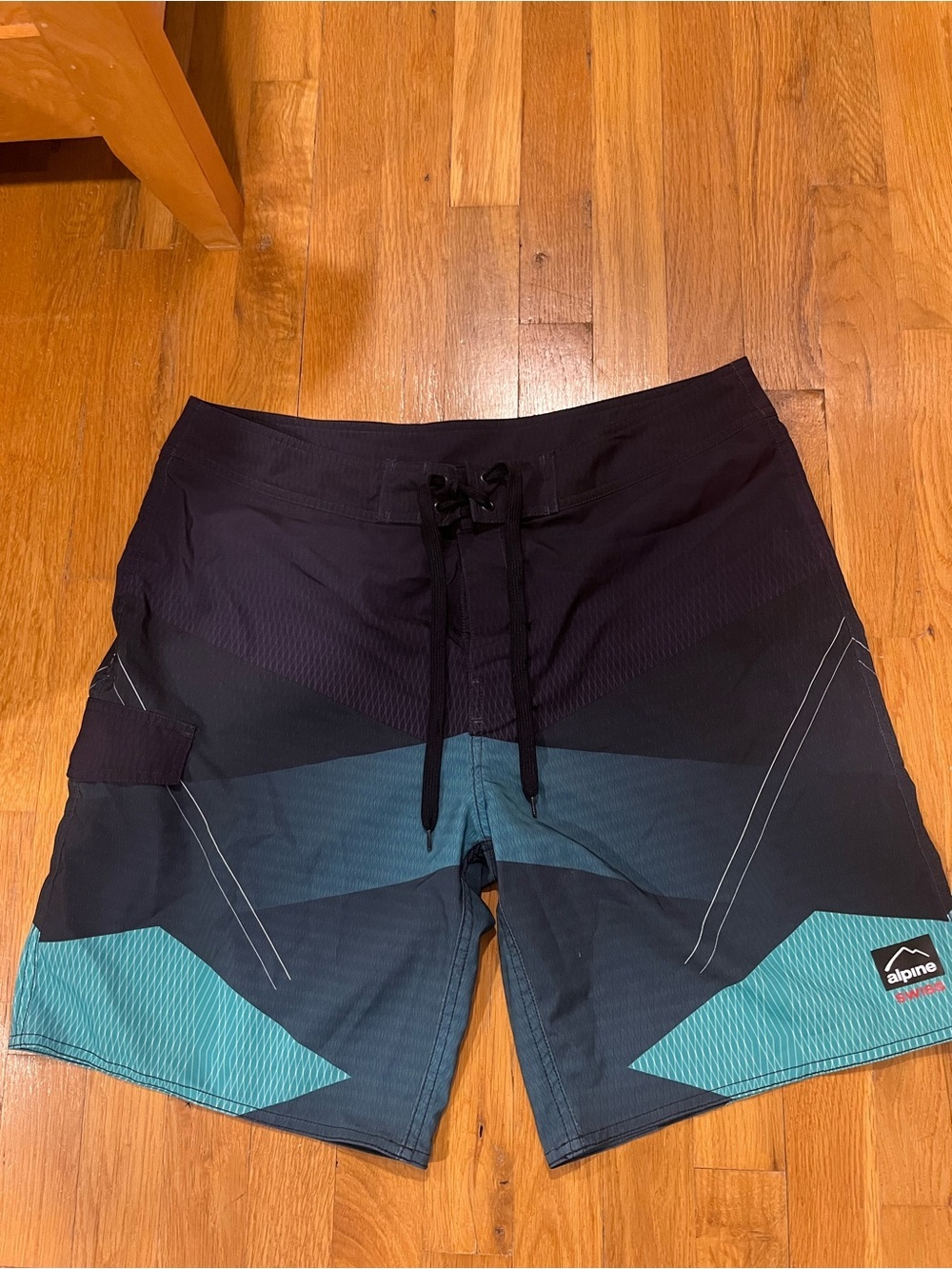 Alpine Swiss Black and Teal Chevron Men’s Swim Board Shorts
